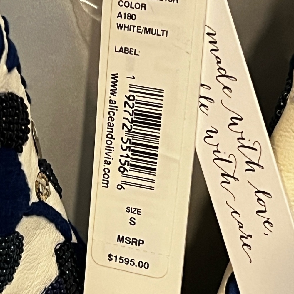 Alice and Olivia beautiful soft and embroidered leather jacket.